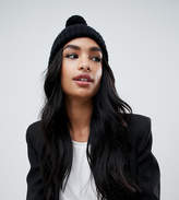 Thumbnail for your product : Missguided knitted bobble hat in black