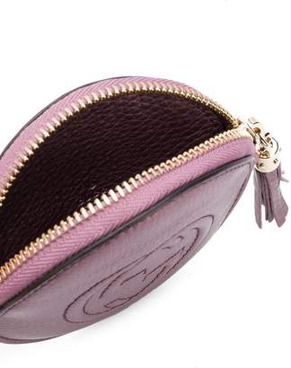 Gucci GG embossed circular purse
