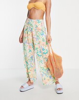 Thumbnail for your product : Billabong Wandering Soul beach trouser in multi floral print