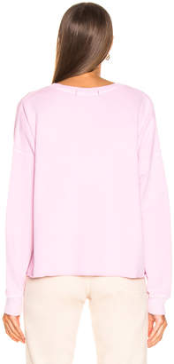 Amo Cut Off Sweatshirt in Faded Pink | FWRD