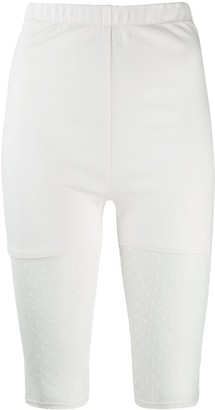 white cycling pants