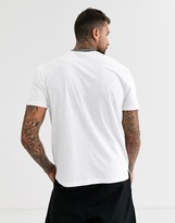 Thumbnail for your product : ASOS DESIGN organic cotton relaxed t-shirt with Legacy print and contrast rib neck