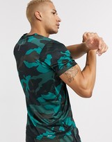 Thumbnail for your product : New Balance Running Accelerate t-shirt in green camo print
