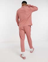 Thumbnail for your product : ASOS DESIGN tapered trackies with fixed hem in pink waffle