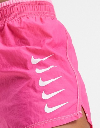 Nike Running swoosh shorts in pink