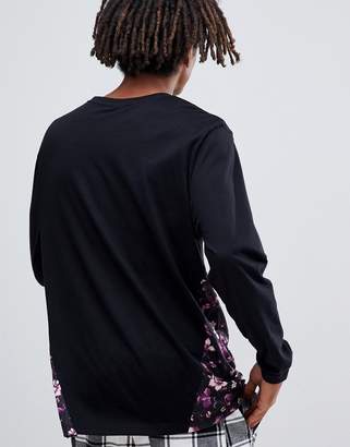 ASOS DESIGN relaxed long sleeve t-shirt with floral panel