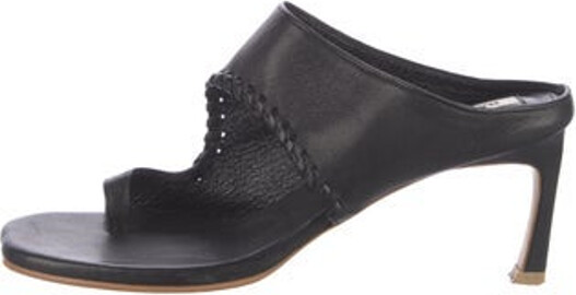 Reike Nen Leather Slides Black Unfortunately, due to restrictions, this item may not be eligible for shipping in all areas.