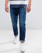 Thumbnail for your product : Wrangler Tapered Jeans in For Real Wash