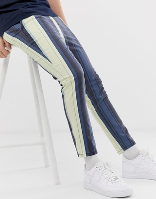ASOS DESIGN slim trousers in washed bold stripe