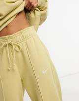 Thumbnail for your product : Nike mini swoosh high waisted wide leg joggers in olive green