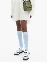 Thumbnail for your product : Ganni Logo-print Cotton-blend Over-the-knee Socks - Light Blue