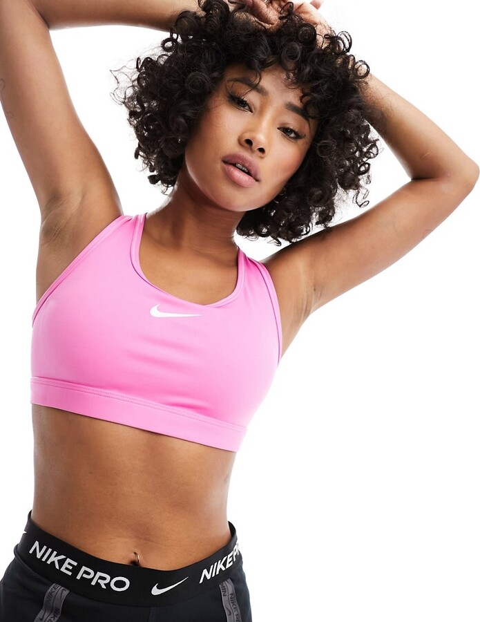 Nike Training Swoosh zip front medium support sports bra in pink