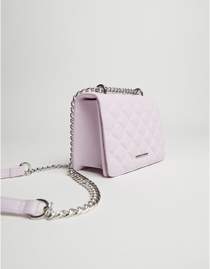 Bershka quilted cross body bag in pink - ShopStyle