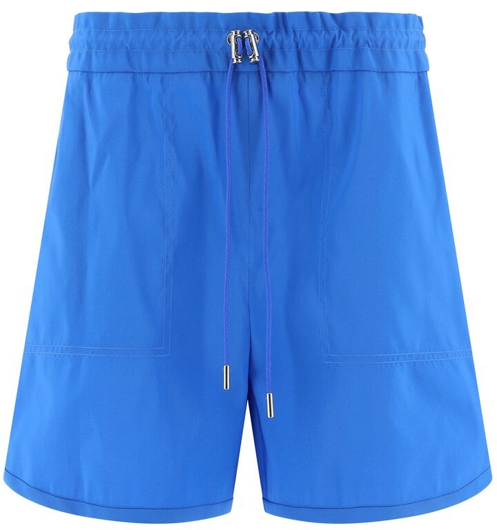 Peplum lace-trimmed shorts de Alexander McQueen de color Neutro Mujer Ropa de Shorts de Minishorts 