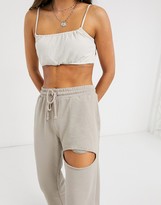 Thumbnail for your product : Collusion ripped wide leg joggers in ecru