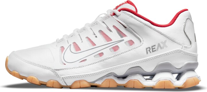 white nike shoes red tick