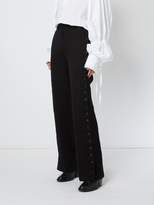 Thumbnail for your product : Ann Demeulemeester buttoned side high waist trousers