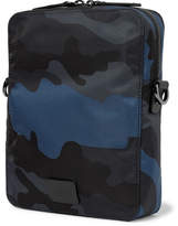 Thumbnail for your product : Valentino Garavani Leather-Trimmed Camouflage-Print Canvas Messenger Bag - Men - Navy