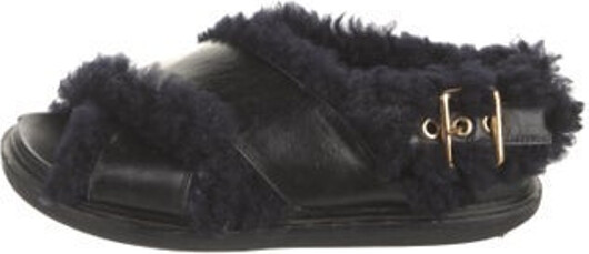 Marni Leather Slingback Sandals Black Shearling Trim Crossover Straps & Buckle Closure at Ankles Includes Dust Bag Unfortunately, due to restrictions, this item may not be eligible for shipping in all areas.