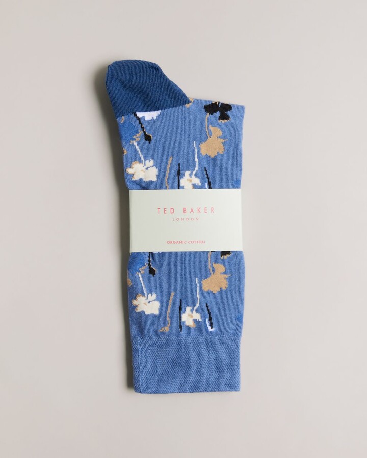 https://img.shopstyle-cdn.com/sim/35/c1/35c192d08c74746d458488d5147e74a5_best/floral-pattern-sock-in-blue.jpg