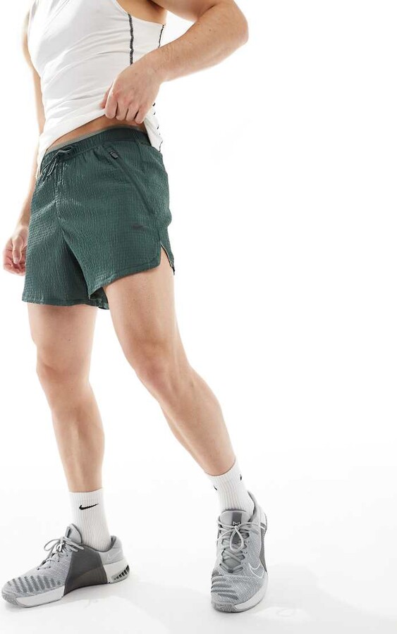 army green nike shorts