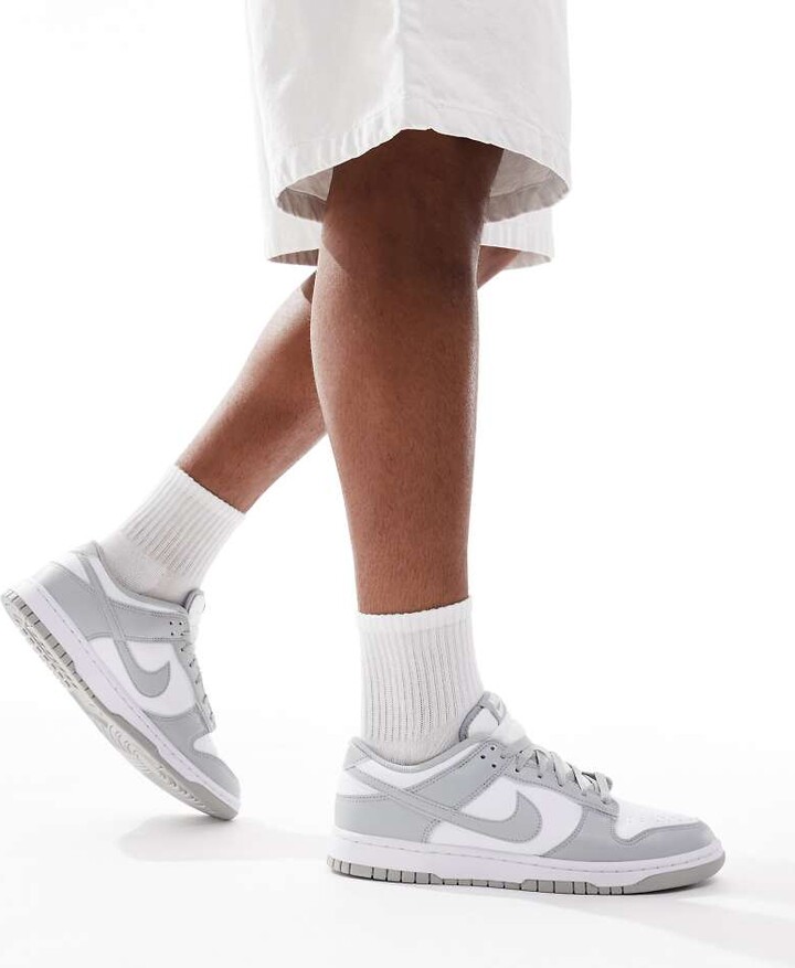 Nike Dunk Low Retro sneakers in gray & white