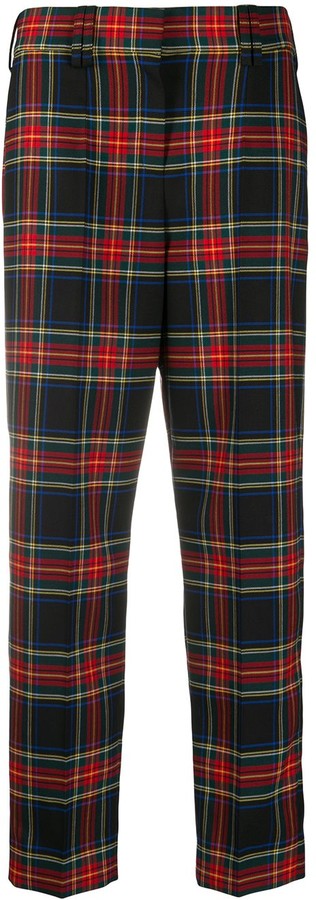 red and black check trousers
