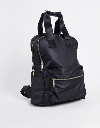 designer backpack with laptop compartment