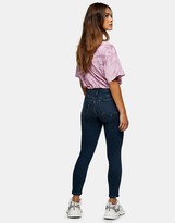 Thumbnail for your product : Topshop Petite Jamie jean in blue black
