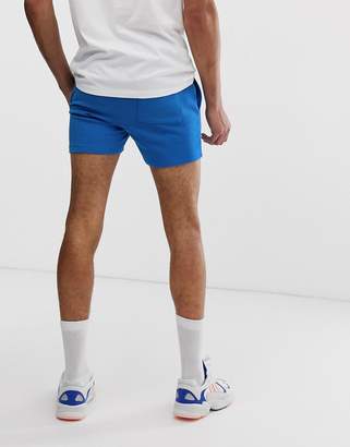 ASOS Design DESIGN Tall jersey skinny shorts in super short length in bright navy-Blue