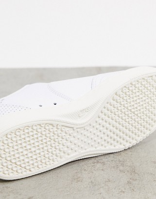 nike court vintage trainers in off white