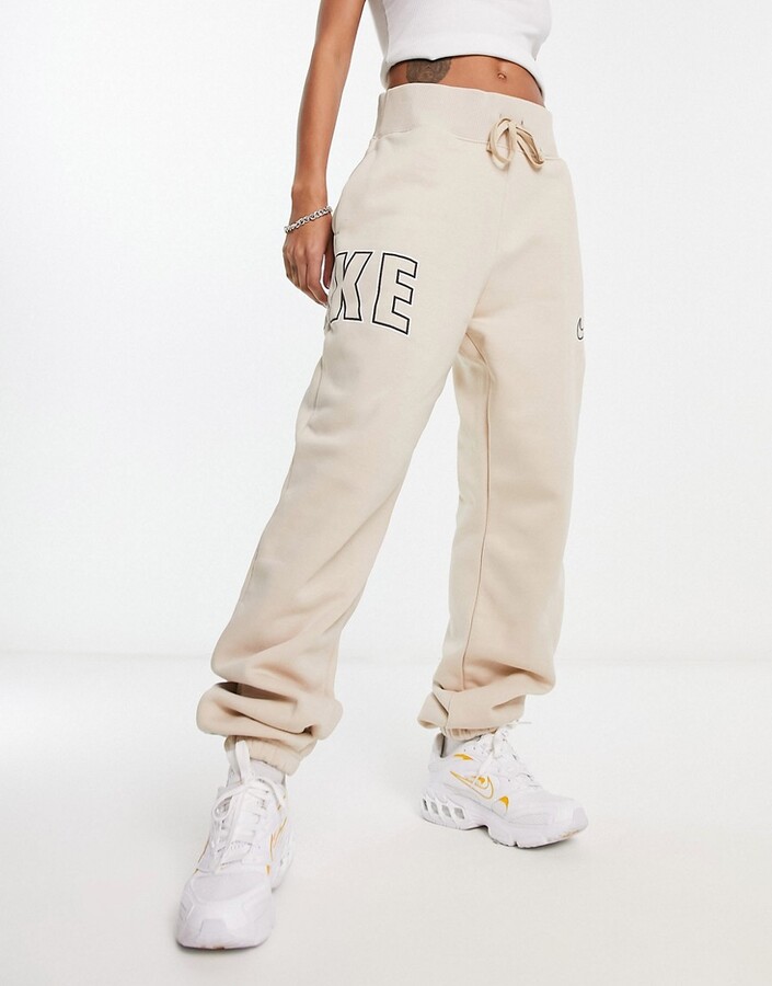 Nike mini swoosh oversized jogger in violet purple - ShopStyle Activewear  Trousers