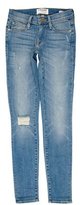 Thumbnail for your product : Frame Denim Distressed Skinny Jeans