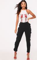 Thumbnail for your product : PrettyLittleThing Black Frill Detail Skinny Trousers
