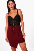 Thumbnail for your product : boohoo Eyelet Lace Up Wrap Front Mini Skirt