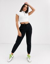 Thumbnail for your product : Collusion Petite skinny trackies in black