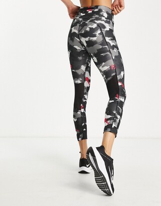 Nike Running Dri-FIT Fast mid rise camo leggings in black