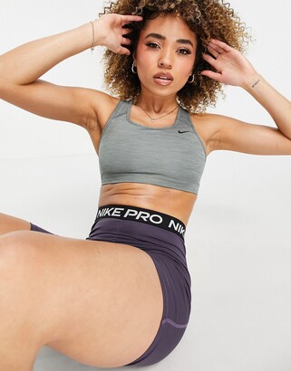 Nike Training Swoosh medium support sports bra in gray - ShopStyle