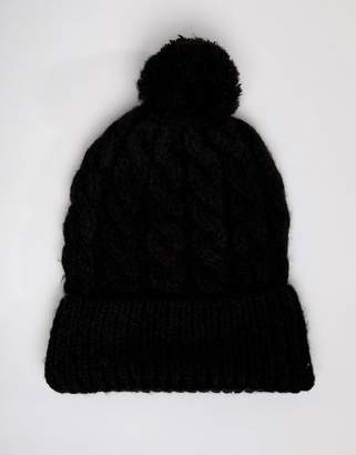 Missguided knitted bobble hat in black