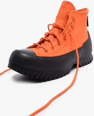 converse lugged high top orange