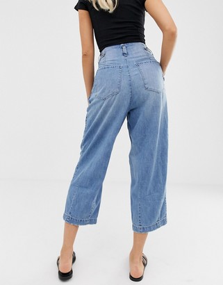 Free People pleated high rise carrot jeans