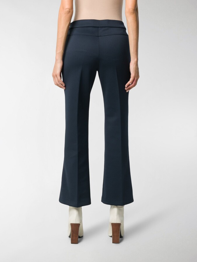 blue bootleg trousers