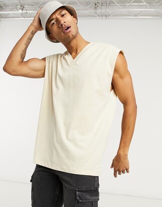 ASOS DESIGN oversized tank top with v neck in beige - ShopStyle Shirts