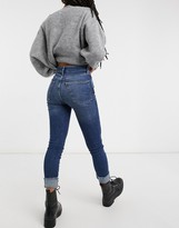 Thumbnail for your product : Free People raw high rise skinny jeans in mid blue