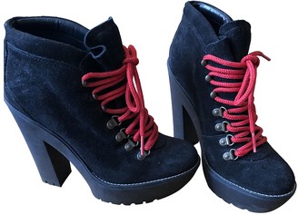 red and black polo boots