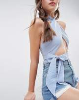 Thumbnail for your product : ASOS DESIGN wrap halter with tie detail in navy stripe