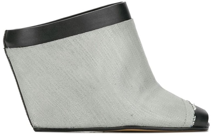grey clogs and mules