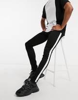 Thumbnail for your product : Criminal Damage skinny fit jeans with side tape detail in black