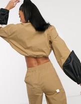 Thumbnail for your product : ASOS DESIGN cropped tracksuit jacket with colour blocking co-ord in camel