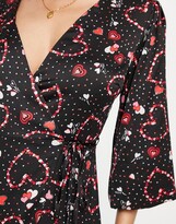 Thumbnail for your product : Liquorish Valentines exclusive midi wrap dress in black heart print